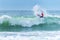 Surfer riding a huge wave during World surf league competition in Lacanau France