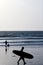 Surfer silhouette kuta beach bali