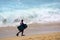 Surfer on Stormy Bronte Beach, Sydney, Australia