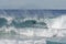 Surfer on wave at inner suburban beach, Sydney Australia