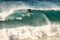 Surfer on wave at inner suburban beach, Sydney Australia