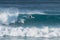 Surfer on wave at inner suburban beach, Sydney Australia