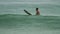 Surfer on the waves at havy rain