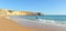 Surfers in the beach of Sagres, Algarve, Portugal