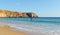 Surfers in the beach of Sagres, Algarve, Portugal