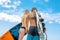 Surfers at the beach- Smiling couple of surfers walking on the beach and having fun in summer. Extreme sport and