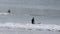 Surfers and bodyboarders enjoying the waves at Portrush Beach North Coast Antrim Northern Ireland