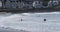 Surfers and bodyboarders enjoying the waves at Portrush Beach North Coast Antrim Northern Ireland