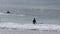 Surfers and bodyboarders enjoying the waves at Portrush Beach North Coast Antrim Northern Ireland