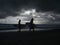 Surfers in Canggu, Bali before the storm