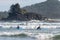 Surfers on Chesterman beach near tofino, BC, Canada