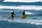 Surfers Entering The Water To Enjoy A Wave Day On Las Americas Beach. April 11, 2019. Santa Cruz De Tenerife Spain Africa. Travel