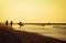 Surfers getting ready on the beach in the morning at rockaway