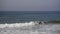 Surfers in Huntington Beach, California