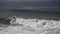 Surfers in Huntington Beach, California