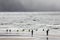 Surfers on Keel Beach in Ireland