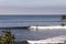 Surfers in Malibu beach, waiting for the waves in summer time in California