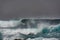 Surfers in the ocean storm, La Snta, Lanzarote, Spain