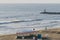 Surfers in the ocean surf at Virginia Beach, VA