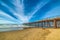 Surfers by the Pier in Pismo beach