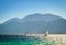 Surfers ride in the sea on the background of the rocky coast in Egypt Dahab