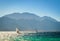 Surfers ride in the sea on the background of the rocky coast in Egypt Dahab