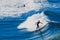 surfers riding big waves in Bondi Beach in Sydney during the Australian winter