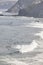 Surfers on the spanish coastline. Sopelana beach in Spain