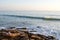 Surfers trying to catch wave in Taghazout