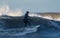Surfers on Tynemouth Beach