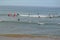 Surfers on Zumaia beach, GuipÃºzcoa, Spain