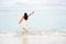 Surfing girl happy excited going surfing at beach