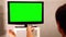 Surfing television channels. TV green screen