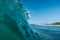 Surfing wave in Atlantic ocean. Blue glassy barrels in Brazil