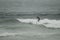 Surfing the waves on the beach of Matosinhos