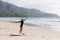 Surfing woman with surfing board on the beach