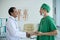 Surgeon Greeting Chief Physician