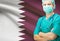 Surgeon with national flag on background series - Qatar