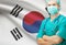Surgeon with national flag on background series - South Korea