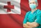 Surgeon with national flag on background series - Tonga