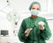 Surgeon woman holding silicon breast implants