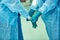 Surgeons wear sterile gloves before surgery