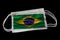 Surgical Masks With Brazil Flag Printed Isolated on Black Background