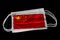 Surgical Masks With China Flag Printed Isolated on Black Background