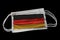 Surgical Masks With Germany Flag Printed Isolated on Black Background