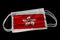 Surgical Masks With Hong Kong Flag Printed Isolated on Black Background