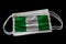 Surgical Masks With Nigeria Flag Printed Isolated on Black Background