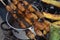 Suri - an Amazonian grub that feeds on palm sap, grilled and served as a snack food in Iquitos, Peru