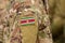 Suriname flag on soldiers arm. Suriname army collage