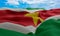 Suriname flag in the wind. Realistic and wavy fabric flag. 3D rendering